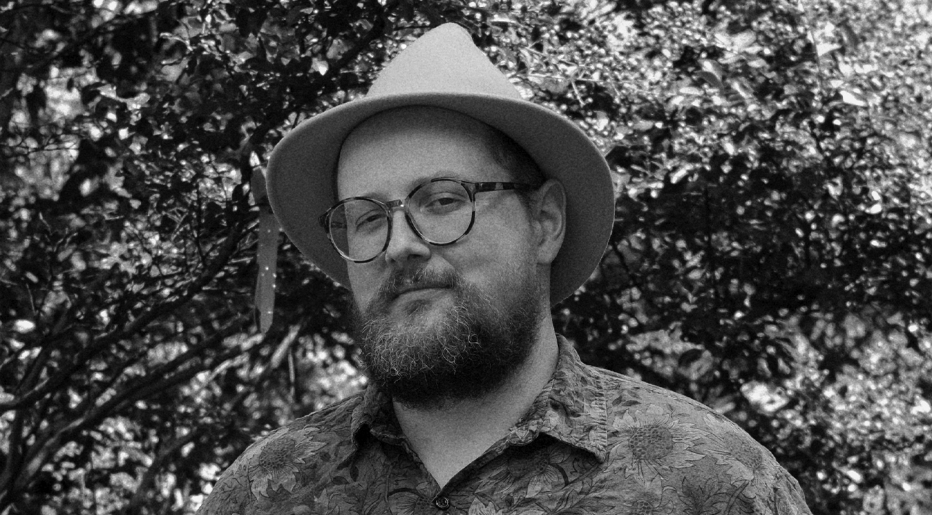 Black & white photo of 'Task' composer Dan Deacon.
